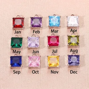 Colección de 12 colgantes cuadrados de piedras de nacimiento para proyectos de joyería DIY.