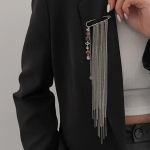 Silver dopamine style safety pin brooch with multi-colored zircons and long chain tassels