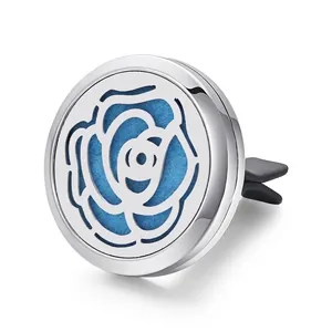 Detail view of polished stainless steel car vent diffuser with hollow rose design