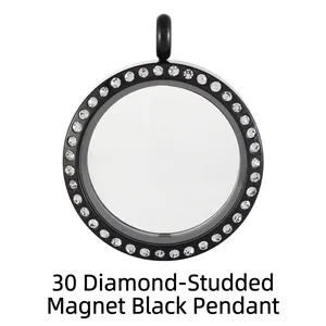 Detailed macro view of black magnetic glass locket pendant featuring clear rhinestone border