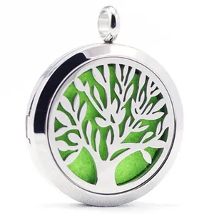 Macro view of Tree of Life stainless steel aromatherapy diffuser locket