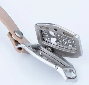 Close-up of rectangular stainless steel aromatherapy locket with leather strap