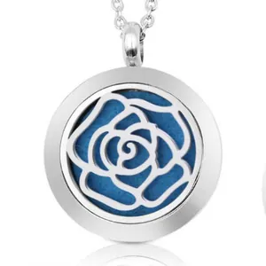 Macro view of a 25mm stainless steel aromatherapy pendant with rose pattern hollow out