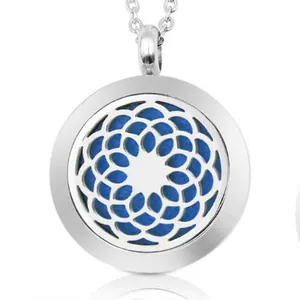 Macro detail of 25mm stainless steel aromatherapy necklace with blue felt pad