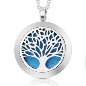 Close-up of stainless steel aromatherapy diffuser pendant with tree of life design