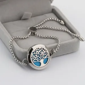 Close-up of 25mm stainless steel aromatherapy diffuser bracelet with tree motif