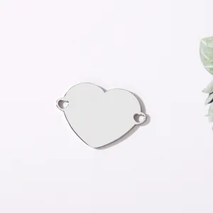 Polished silver stainless steel heart-shaped pendant with double side holes for DIY jewelry