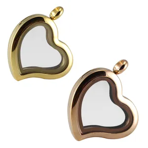 Detail view of heart-shaped stainless steel glass locket pendants in gold and rose gold