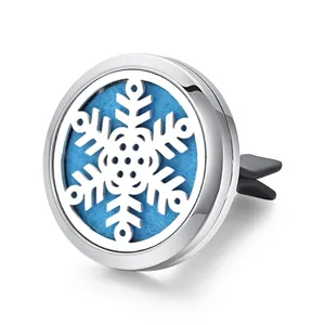 Detailed view of stainless steel snowflake hollow aromatherapy car vent clip holder