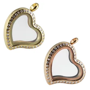 Close-up of heart-shaped glass locket pendants in gold and rose gold with crystals