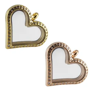 Close-up detail of stainless steel heart glass locket pendant in gold and rose gold