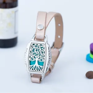 Rectangular stainless steel tree of life locket aromatherapy bracelet with leather strap.