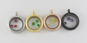 Four color variations of frosted stainless steel glass locket pendants with colored gems