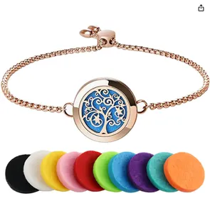 Close-up of rose gold Tree of Life aromatherapy bracelet with multi-colored pads
