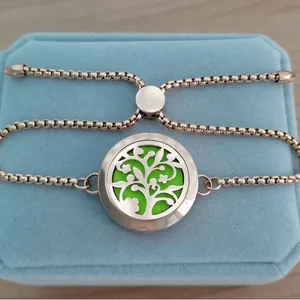 Rose gold tree of life aromatherapy diffuser bracelet with adjustable stainless steel chain.