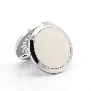 Elegante colgante relicario redondo de acero inoxidable para aromaterapia premium.