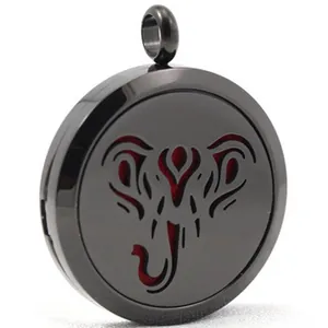 Macro detail of black stainless steel aroma diffuser pendant with elephant motif