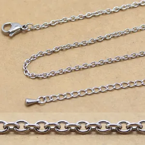 High-quality macro detail view of a silver stainless steel link chain for necklace jewelry