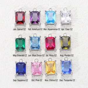 Set di 12 ciondoli rettangolari portafortuna con zirconi 6x8mm e castone in acciaio