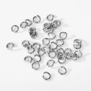 Detailed close-up of multiple silver 304 stainless steel jump rings for DIY jewelry