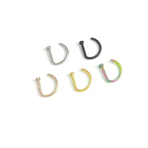 Set of 5 D-shaped titanium steel nose rings in multiple colors on white background