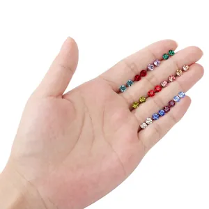 Set of 12 multi-color birthstone stud earrings in titanium steel with round crystals