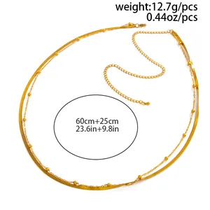 Vue détaillée de la chaîne de corps en acier inoxydable doré avec mesures de taille.
