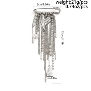 Silver heart tassel brooch with pearl details showing size 5cm x 13cm and weight metrics