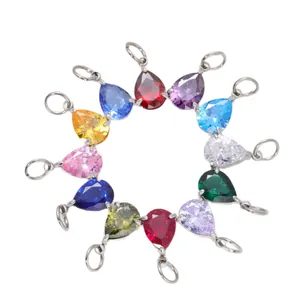 Juego de 12 colgantes de circonita cúbica multicolor con forma de pera en acero inoxidable