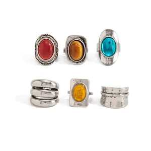 Collection of six vintage French style silver rings with colorful oval gemstones
