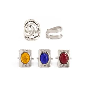 Set of five vintage French rings with colorful gemstones and engraved silver finish