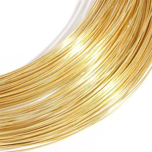 Macro view of shiny 14K gold-plated semi-hard copper wire for DIY jewelry crafting