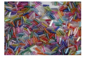 Close-up of vibrant 2x7mm iridescent glass bugle beads for DIY necklace jewelry making