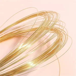 Macro view showing the metallic shine of 14K gold filled copper wire for DIY jewelry
