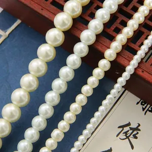 Perles d'imitation en verre blanc rond de différentes tailles pour bijoux DIY