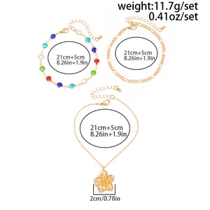 Size details for three gold-tone anklets with colorful beads and flower pendant charm.