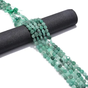 Macro view of high-quality natural green loose beads for DIY handmade jewelry making
