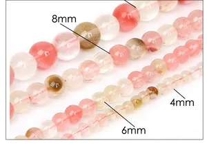 Close-up showing 4mm, 6mm, and 8mm watermelon pink natural stone round beads for DIY