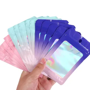 Macro view of colorful holographic resealable packaging bags with clear window for jewelry