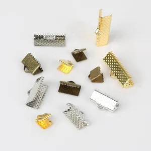 Assorted metal ribbon crimp ends and clamps for DIY jewelry making materials