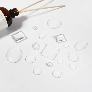 Premium clear round and square glass cabochons for DIY jewelry making and craft projects.