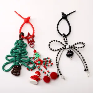 Handmade festive Christmas tree and black cat bow-tie silicone bag charm keychains DIY