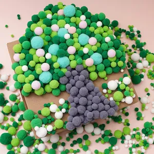 Creative tree craft made of colorful soft polyester pompoms for DIY projects
