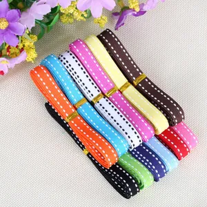 Detailed view of multicolored 10mm saddle stitch grosgrain ribbons for gift packaging DIY crafts