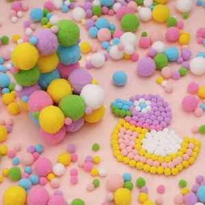 Colorful soft polyester pom poms set for creative children's DIY crafts and decorations.