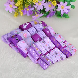 Assorted purple patterned grosgrain ribbons for gift packaging and DIY crafts set