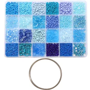 Top-down view of 24-grid blue glass seed beads kit with silver jewelry wire