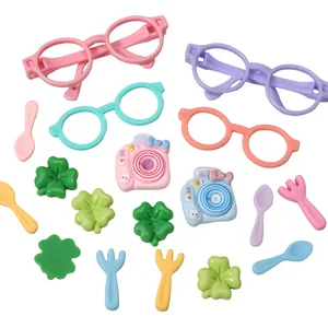 Mixed cartoon resin charms including camera, eyeglasses, and cutlery for DIY crafts.
