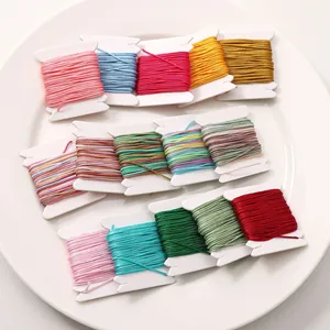 Close-up of assorted multi-color 0.8mm nylon braided threads for DIY jewelry making crafts