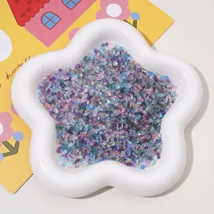 Macro view of colorful irregular AB iridescent glass crushed stones for DIY craft filling